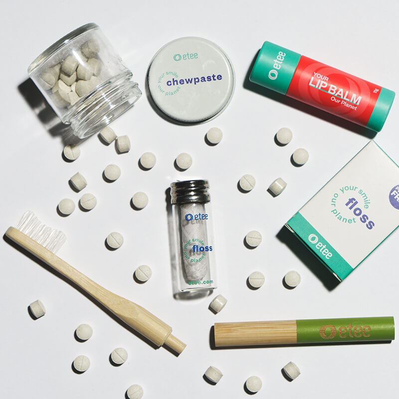 dental products and toothbrush with green highlight