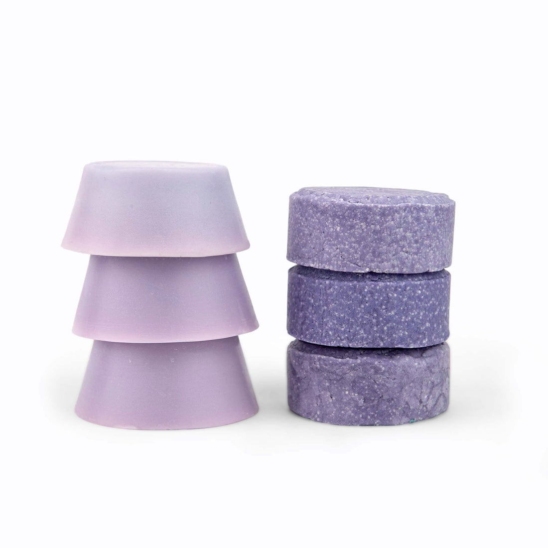 a purple round conditioner bar and shampoo bar