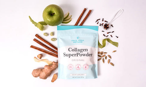 Collagen Super Powder packaging surounded by all natural ingredients - green apple peel, white mulberry, cinnamon, ginger, cloves, cardamon