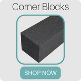 acoustic foam corner blocks - charcoal color shown in this picture - with a shop now button