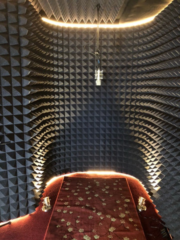 vocal booth with 4 inch pyramid foam panels installed on the walls and ceiling
