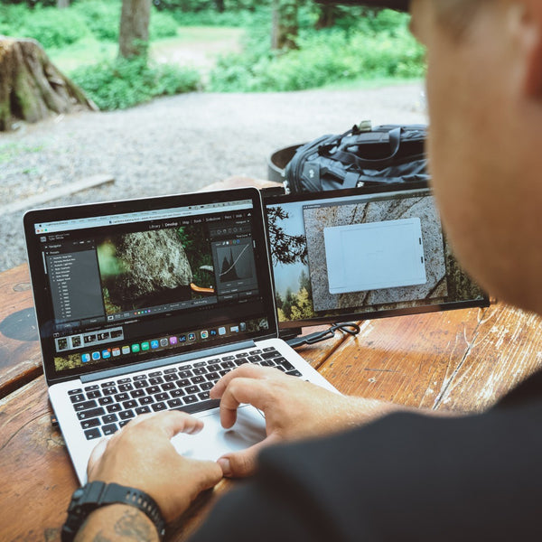 person using monitor for photo editing