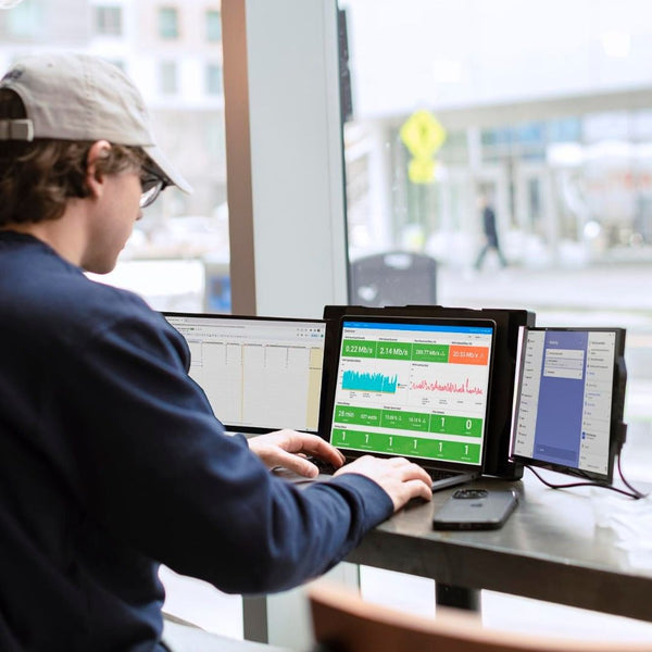 Triple Monitor Laptop Setup in Action