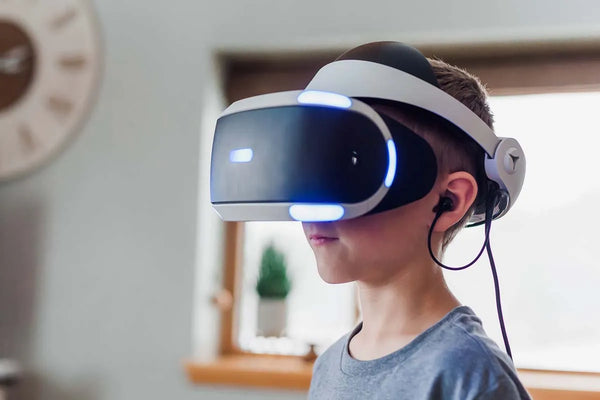 child using VR headset as an interactive technology tool