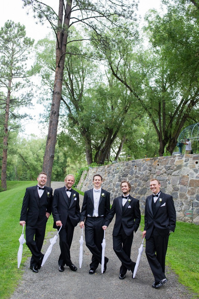 How cute is this photo of the groomsmen just hanging out, lookin' dapper. Find umbrellas for rent or for sale at weatherornotaccessories.com | Wedding Planner: Sapphire Celebrations | Photography: Jamee Photography