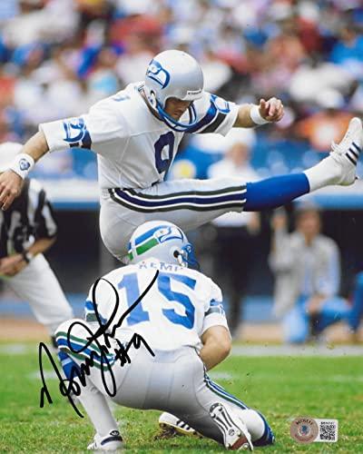 Steve Largent Autographed 8x10 Photo Seattle Seahawks HOF 95 Hit Fumble  On Mike Harden MCS Holo Stock #211084