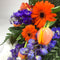 Close up of Porirua florist arranging gerberas