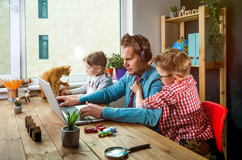 Man working from home with kids