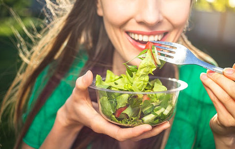 Woman Eating Salad