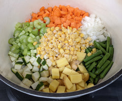 ingredients chopped up and ready to mix inside pot