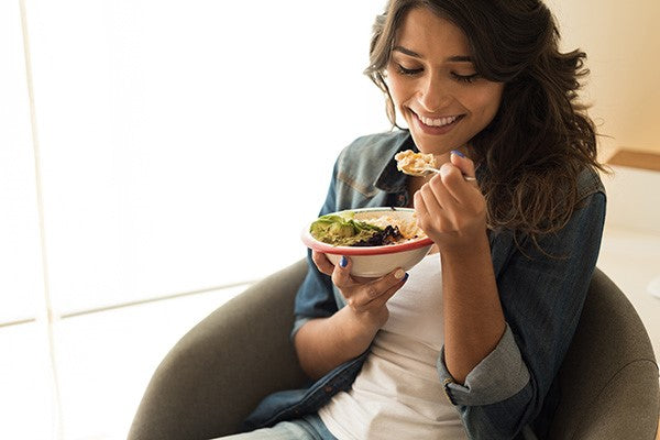 Woman enjoys a heart-healthy meal