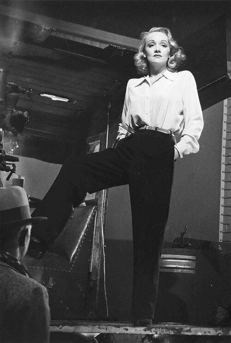 1940s star Marlene Dietrich wears the pants– trousers with deep pockets, to be exact.