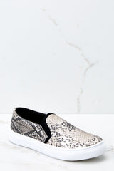 snake print slip on sneakers