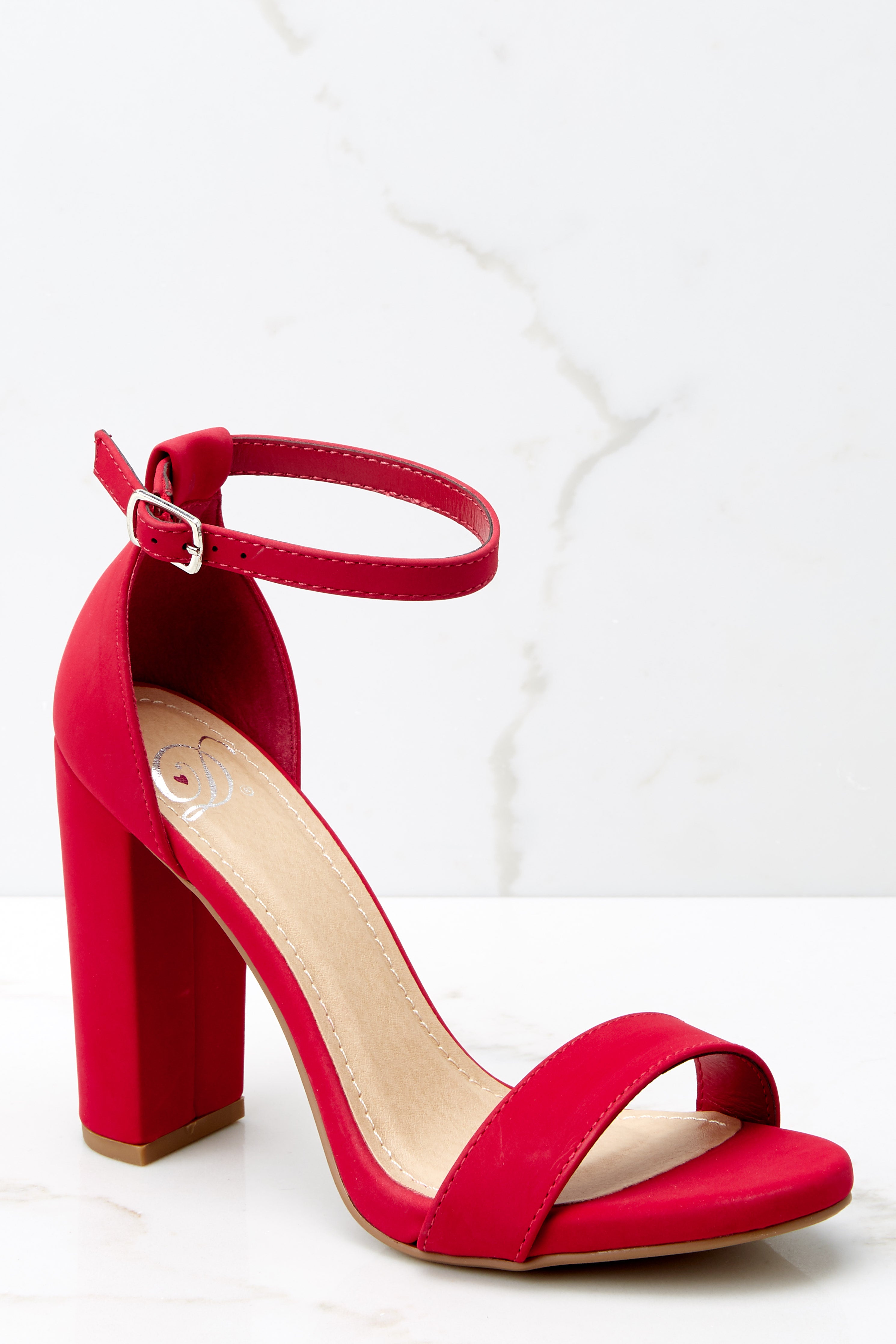 red ankle strap