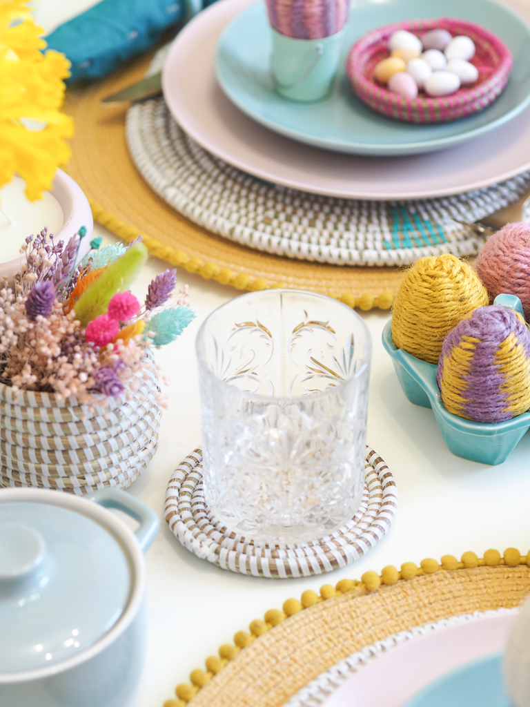 vintage glassware on a colourful easter table setting