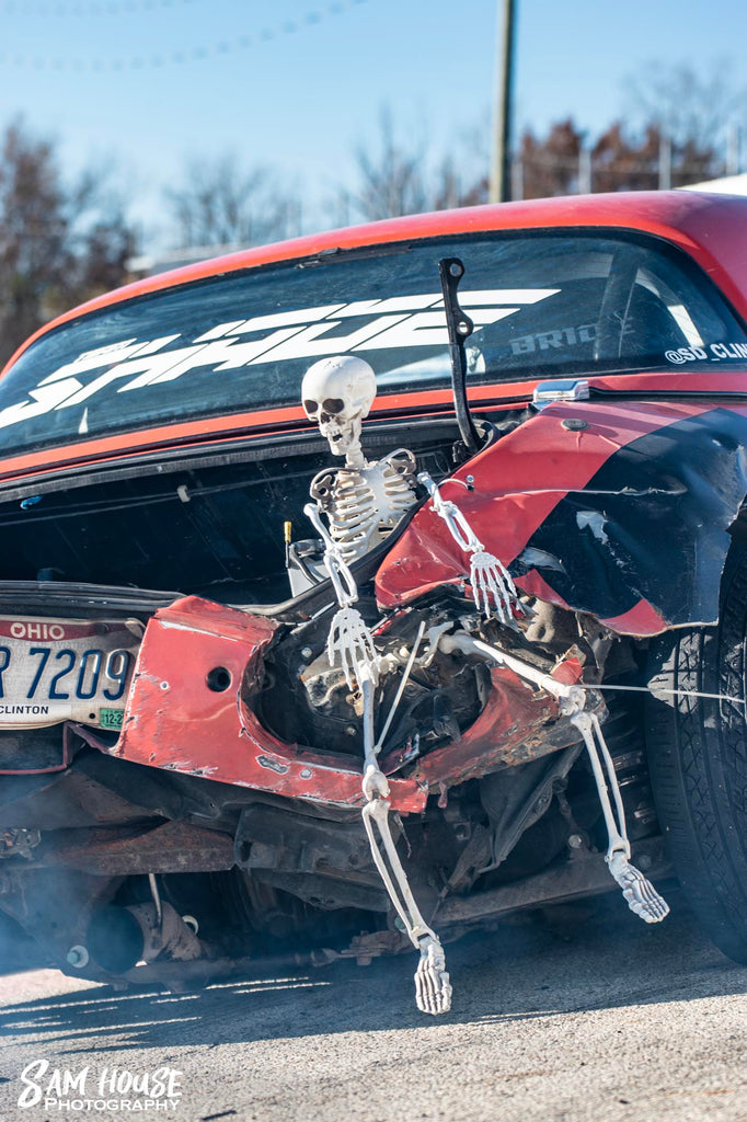 Clint Stotts' miata with a skeleton in the trunk