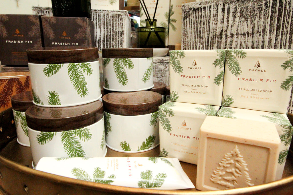 At Portland's Ink and Peat boutique, woodsy scented candles are popular during the holidays.