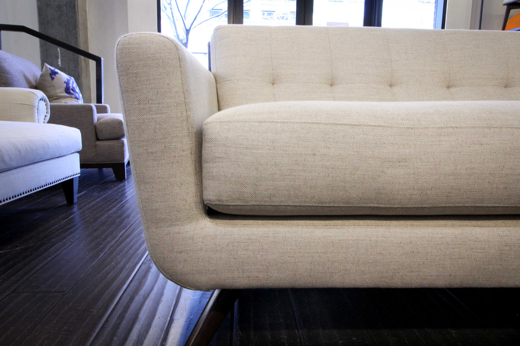 The Cooper sofa has a slightly flared rounded arm