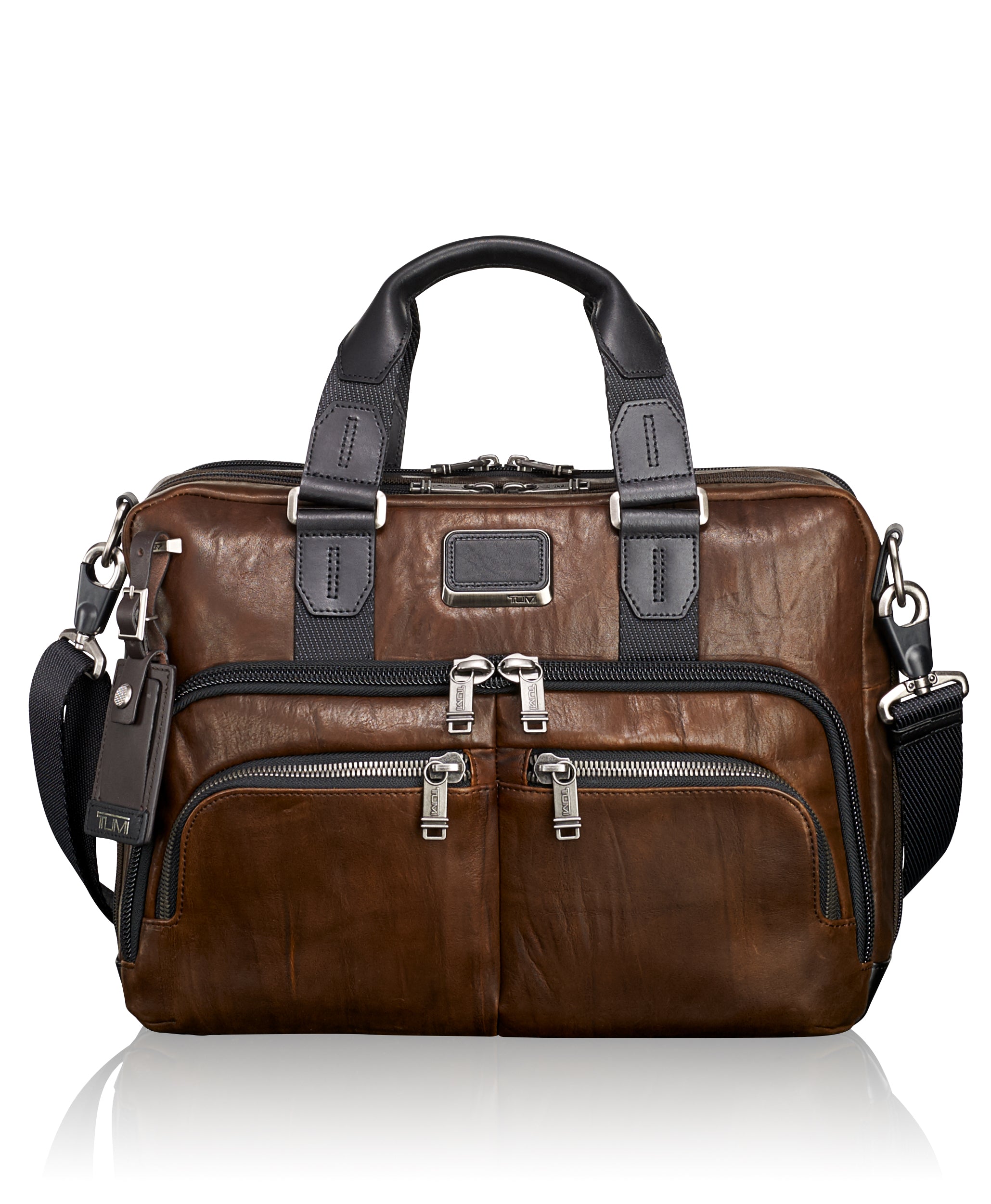 tumi leather bags