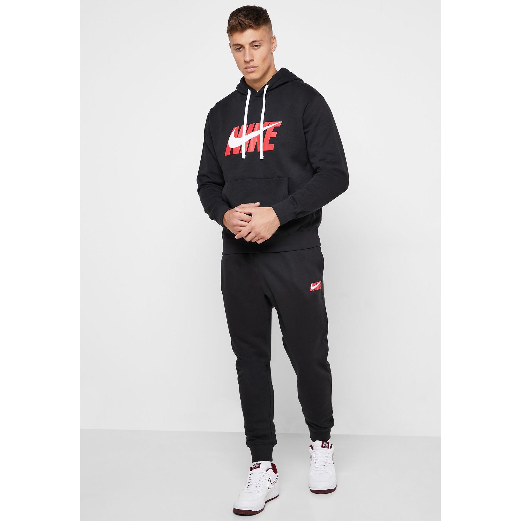 nike tracksuit black and red