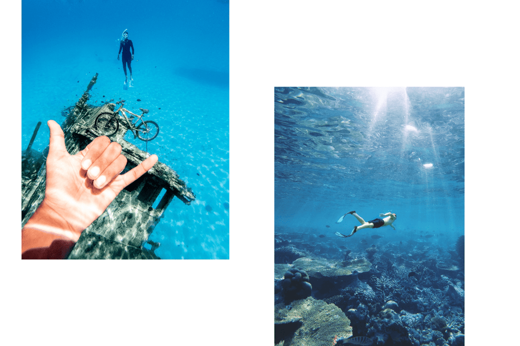 Freediving in the ocean wearing fins, mask and snorkel. Practicing to hold their breath while surrounded by beautiful coral reefs and ocean. 