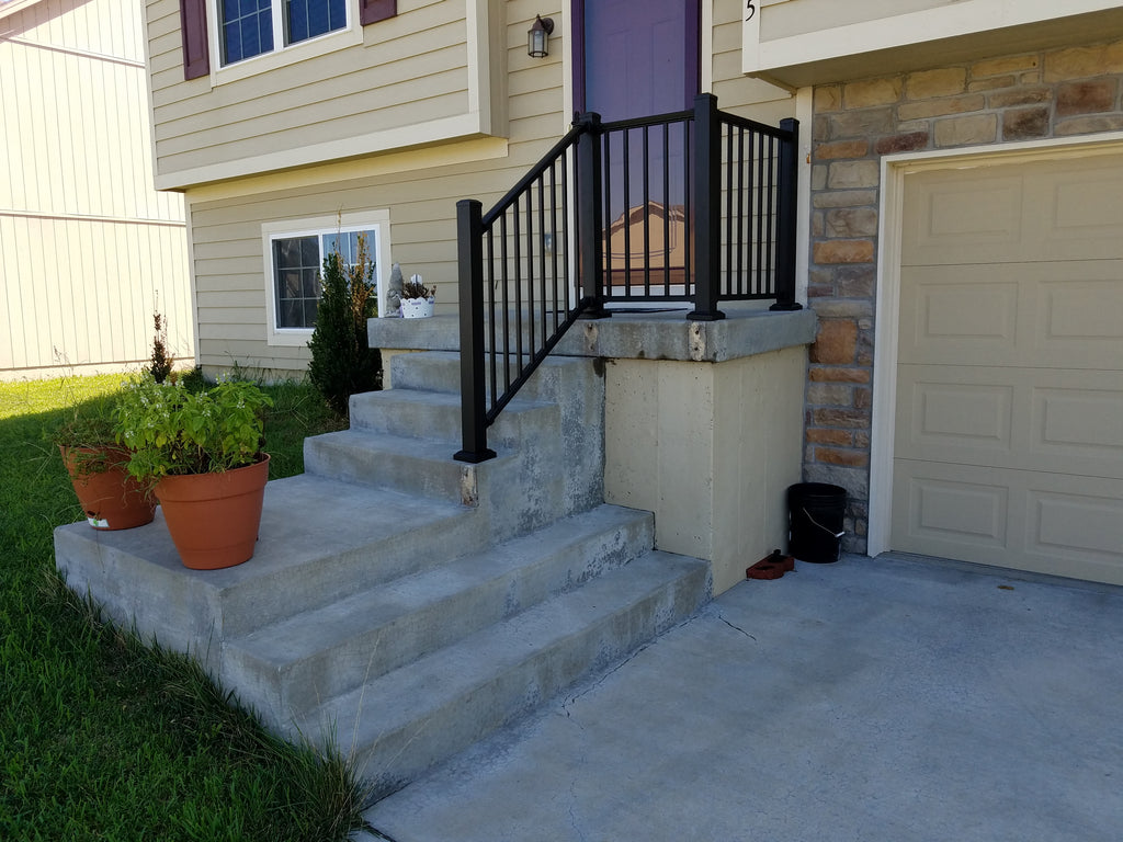 Front Railing stair rail to protect from falling on a split level home in Gardner Kansas in aluminum railing handrail