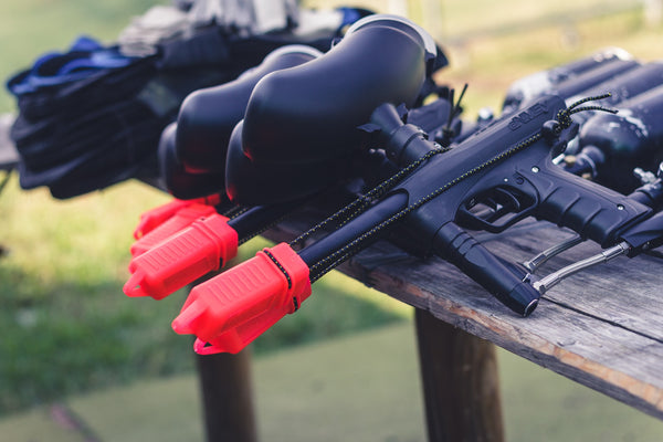 Paintball guns on a table and ready to use