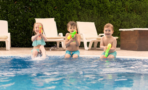 childrens-playing-with-water-guns-while-pool_23-2148606602 1.png__PID:da0ec579-7b9a-4620-8a5f-1e8695feb49c