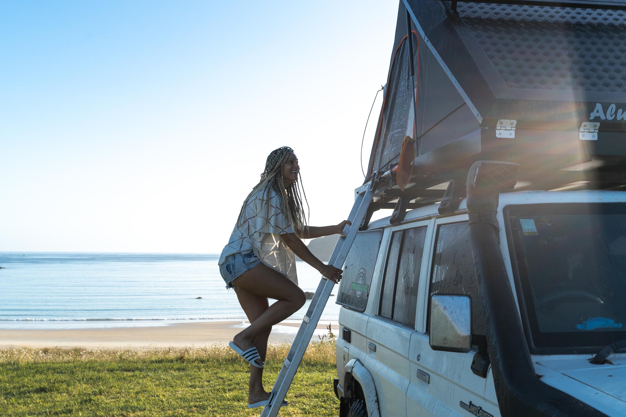 babe in Alu-Cab roof top tent