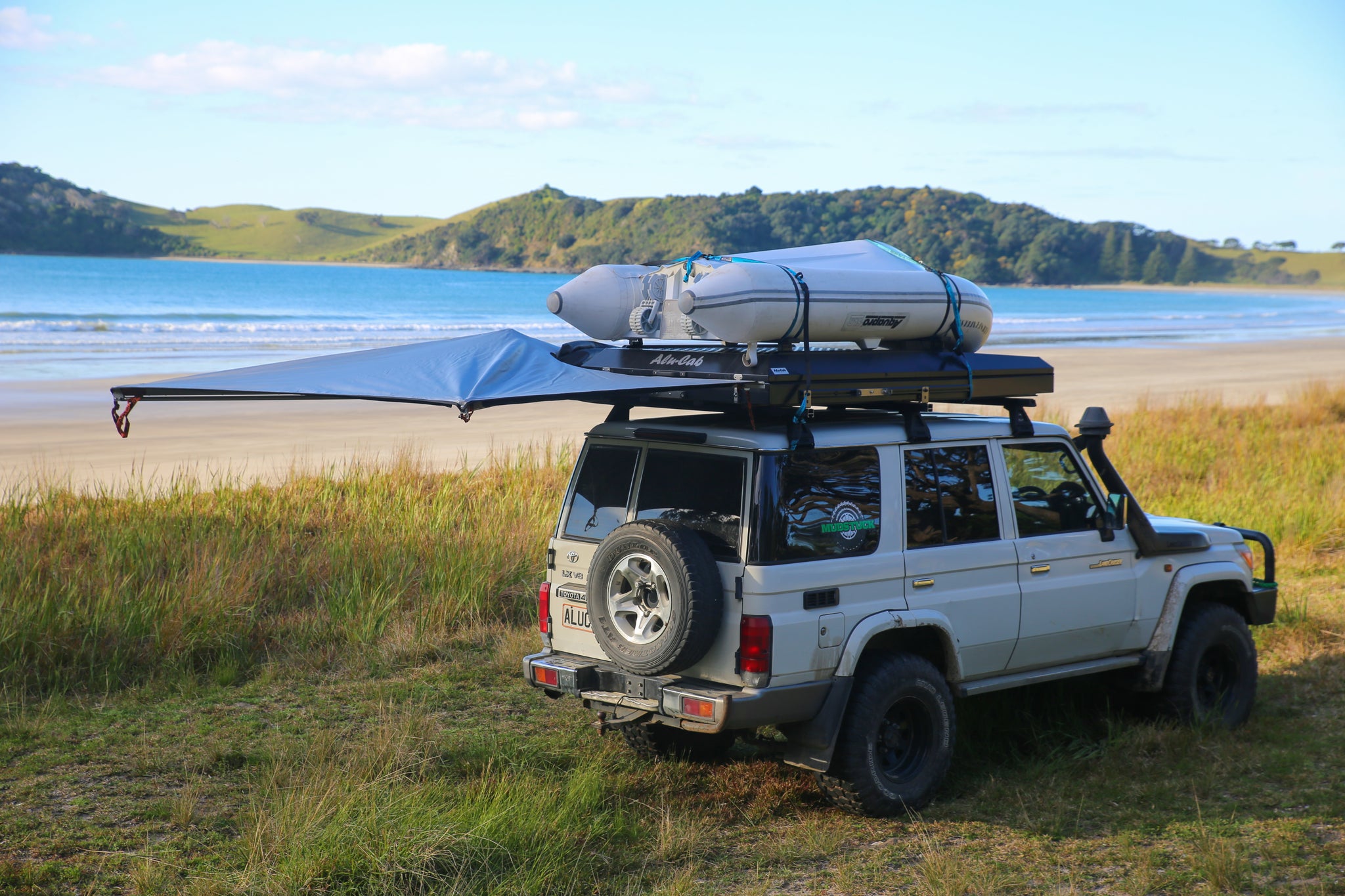 Mudstuck Alu-Cab Gen3 roof top tent and Shawdow Awning with a Landcruiser 76