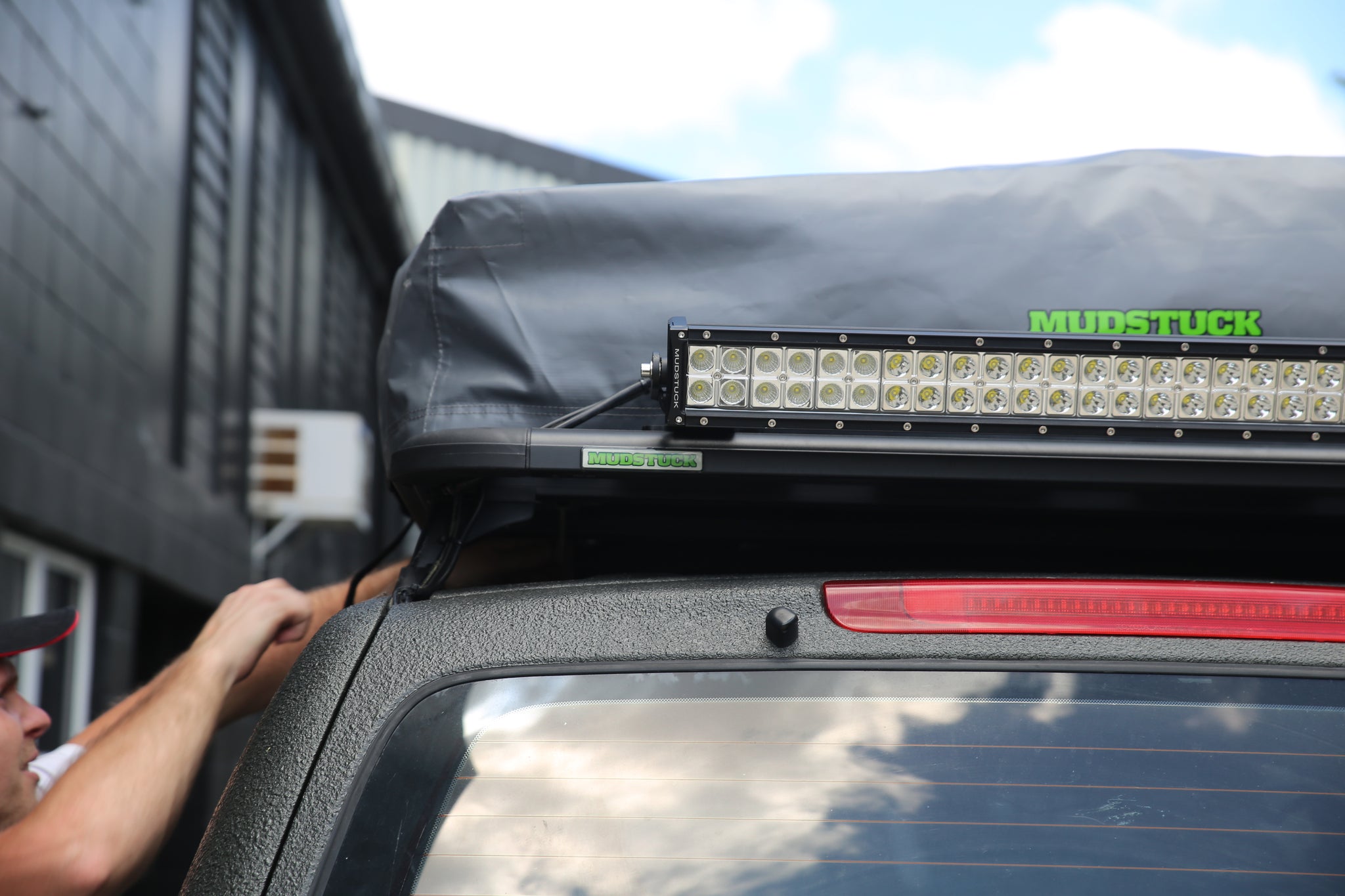 Put roof top tent on roof racks