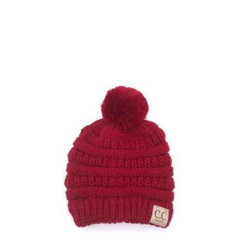 baby in red beanie