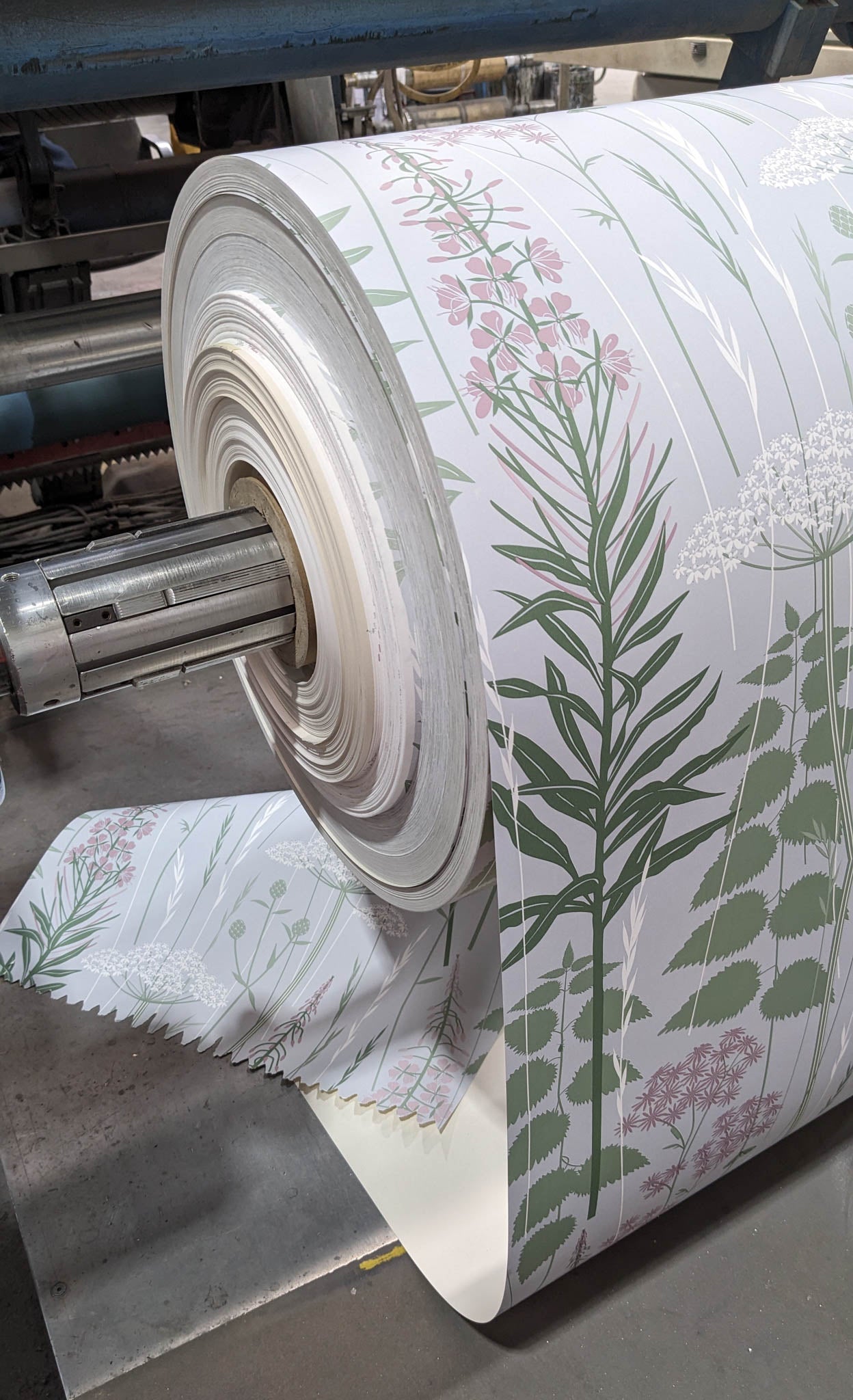 wild edge wallpaper in full bloom being printed at the factory