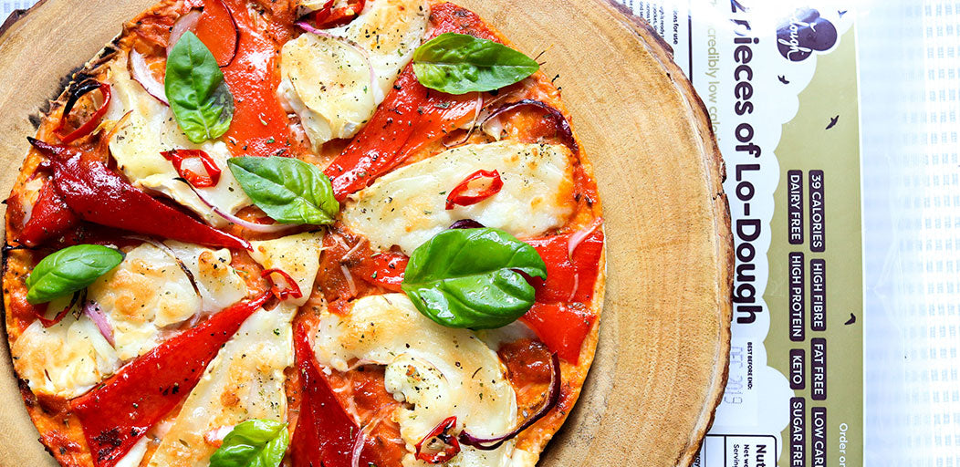 Vegetarian roasted red pepper and goats cheese pizza on a Lo-Dough pizza base