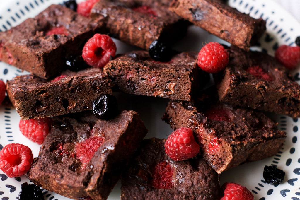 Low calorie gluten free brownies with raspberries and cherries