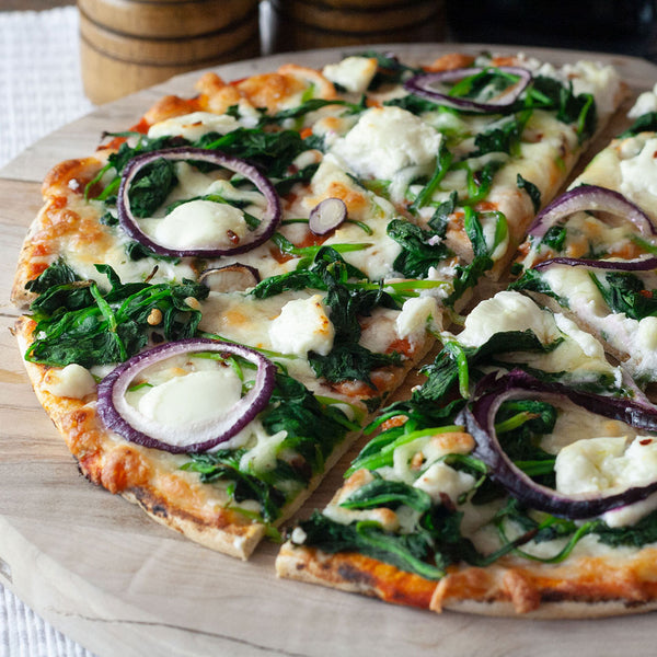 Healthy vegetarian Padana Lo-Dough pizza on a wooden board