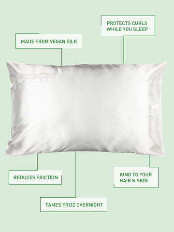 the curlsmith pillowcase in front of a green background with labels highlighting the benefits