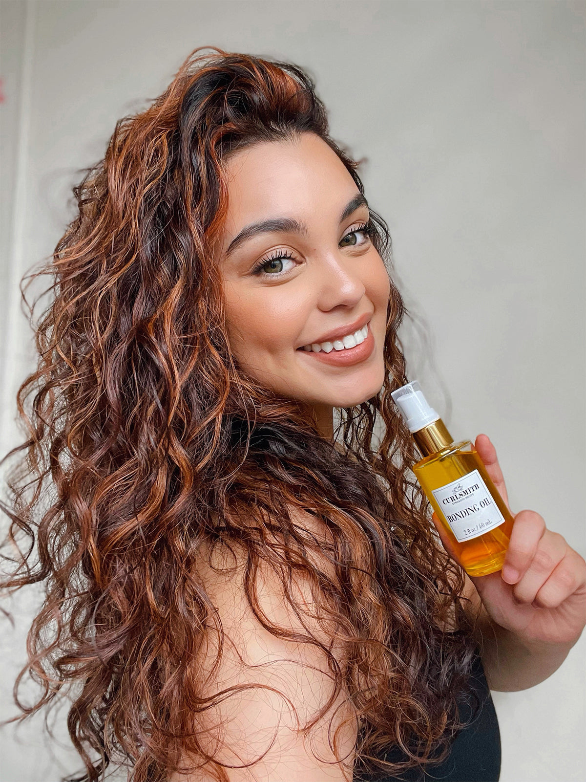 5 Essential Benefits of Hair Oil for Curls – Curlsmith USA