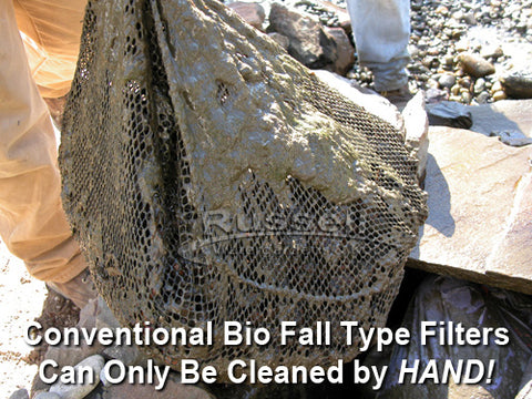 Hand removing a soiled media net from an annually cleaned biofalls filter