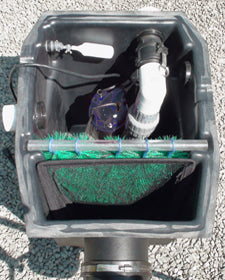 HydroClean pond skimmer with rear outlet port being used with a submersible pump