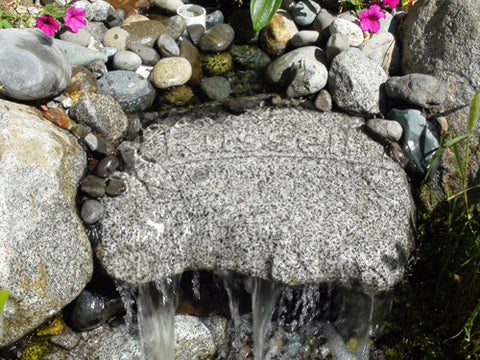 Hydro Vescense cleaned this waterfall rock