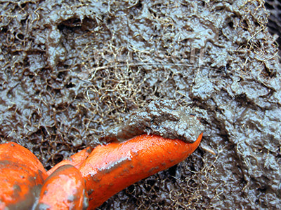 Close-up of a sludge filled filter pad from a biofalls filter