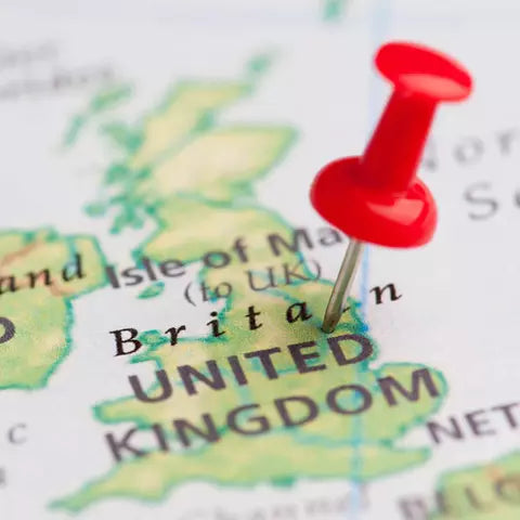 red push pin in map of uk