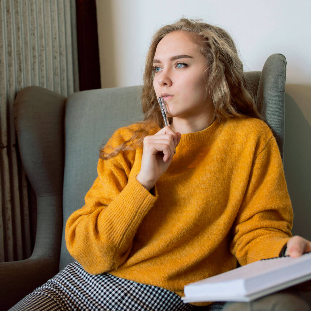 woman sitting and thinking