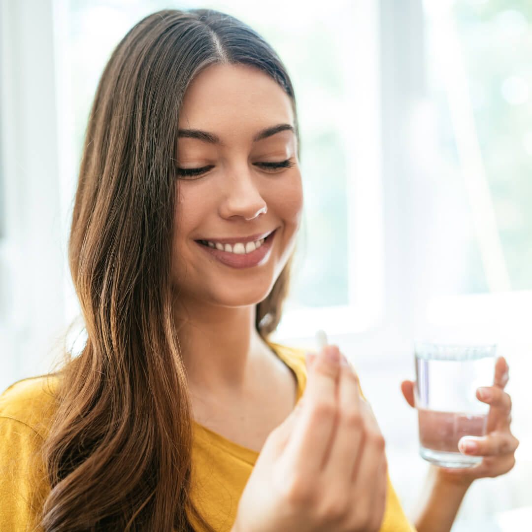 woman taking brainzyme focus pro