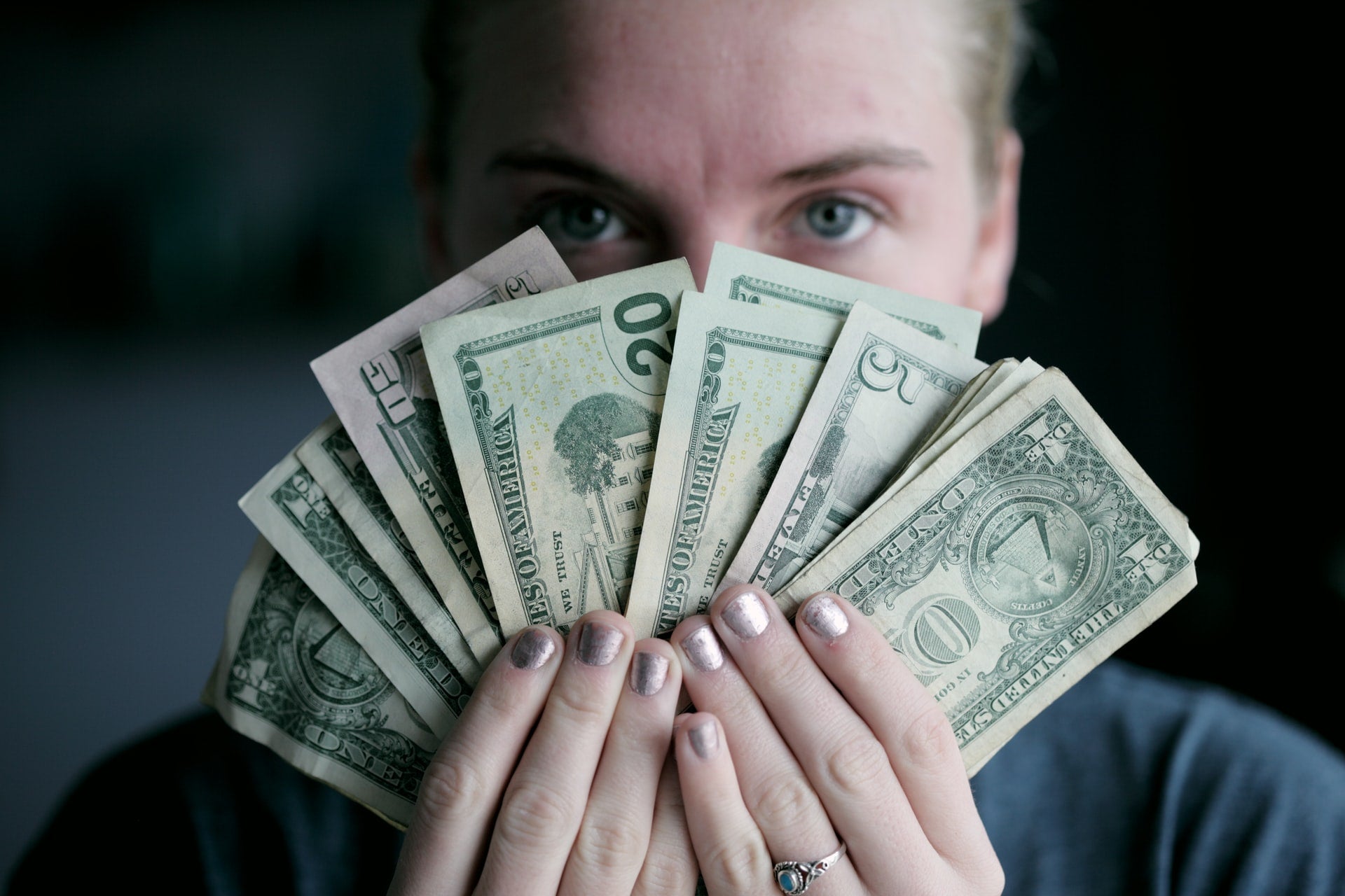 Girl with a money on her hands