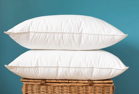Two Down Pillows on a Wicker Basket | scooms