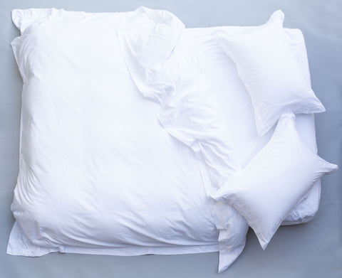 View of Made Bed From Above With White Cotton Sheets| scooms