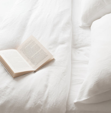 Linen Bedding in White on Bed with Book | scooms