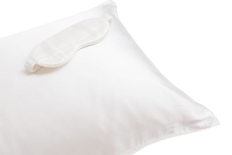 White silk pillowcase and eye mask
